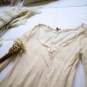 Semi-sheer off white knitted long sleeve